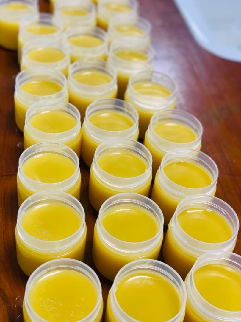 Beeswax product jars from community livelihood programme